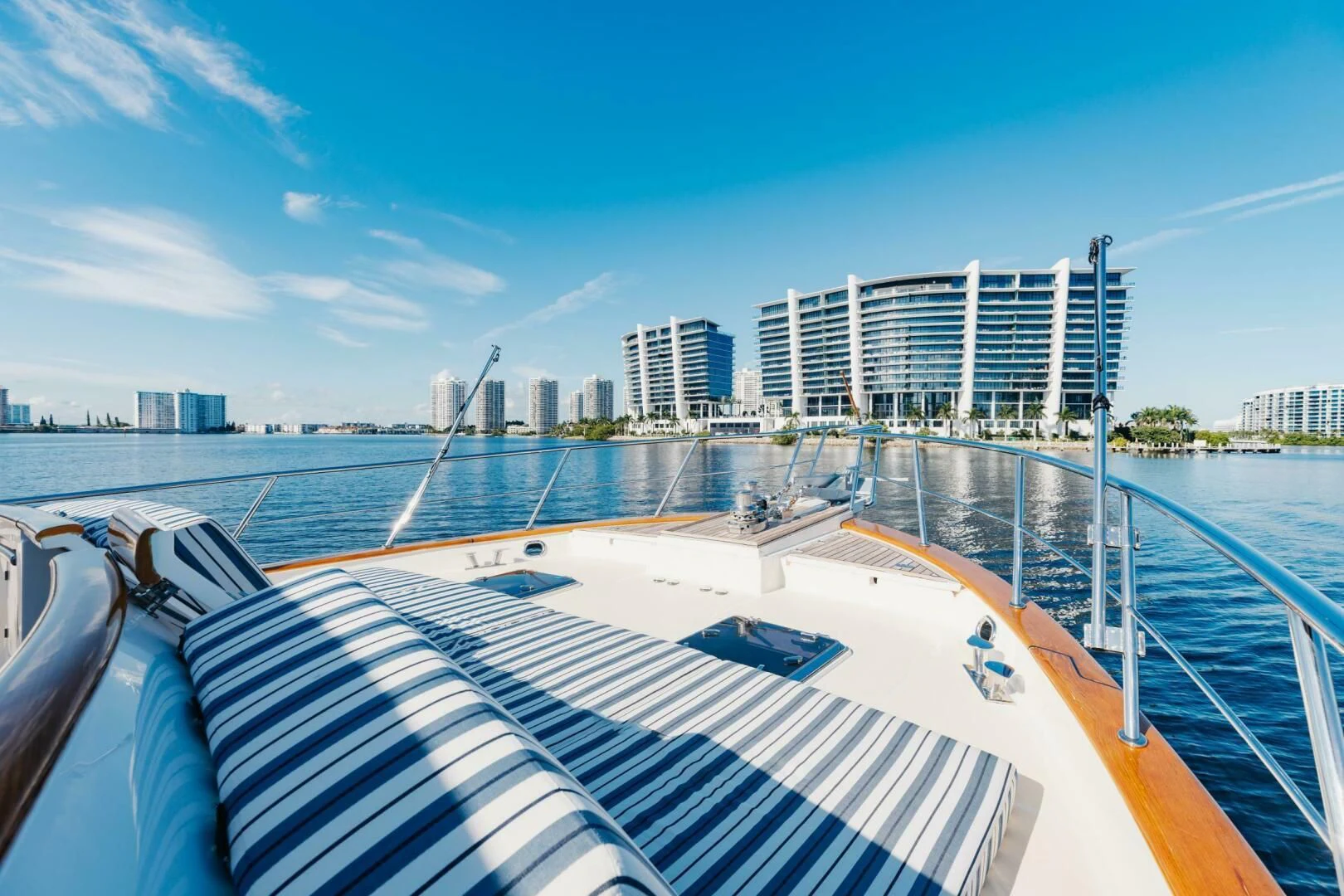 a deck with a view of a city and water aboard VIRGINIA SEA Yacht for Sale