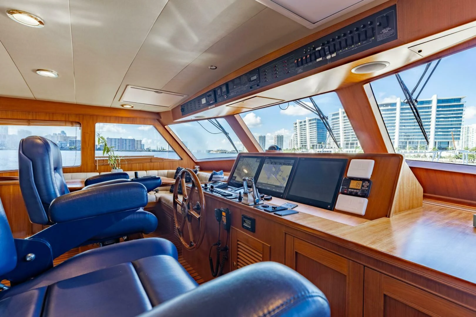 inside of a bus with a desk and chairs and computers aboard VIRGINIA SEA Yacht for Sale