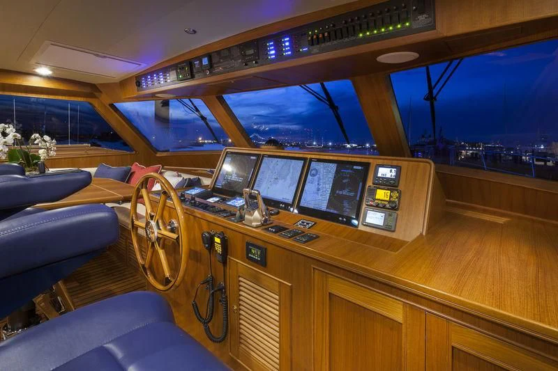 a wooden boat with a large wooden boat in the water aboard VIRGINIA SEA Yacht for Sale