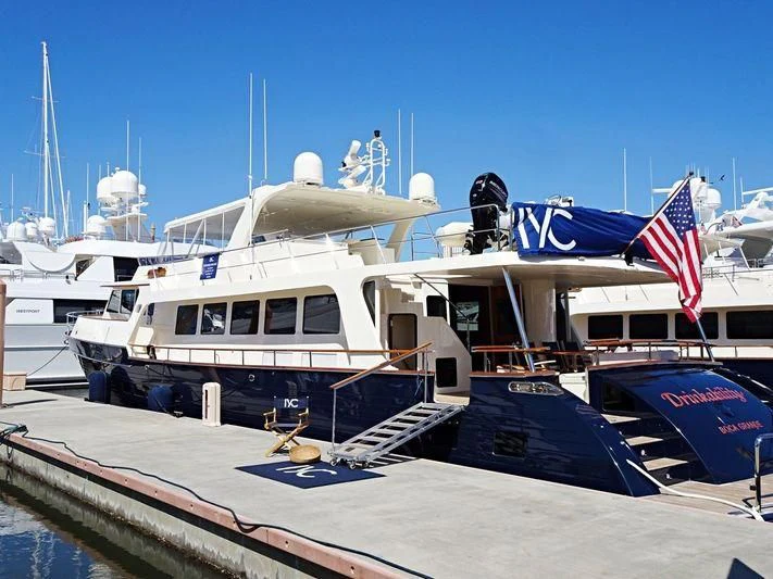 a boat docked at a pier aboard VIRGINIA SEA Yacht for Sale