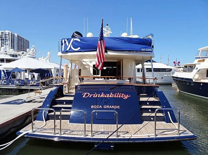 a boat with a flag on it aboard VIRGINIA SEA Yacht for Sale