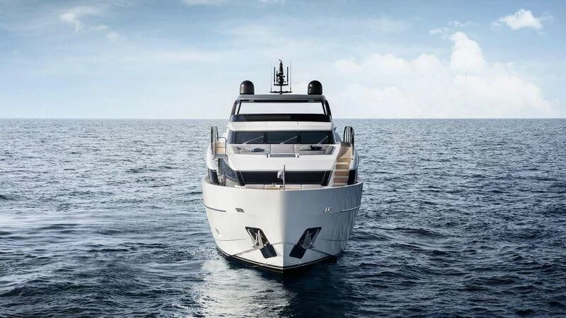 a white boat in the water aboard SEVEN Yacht for Sale