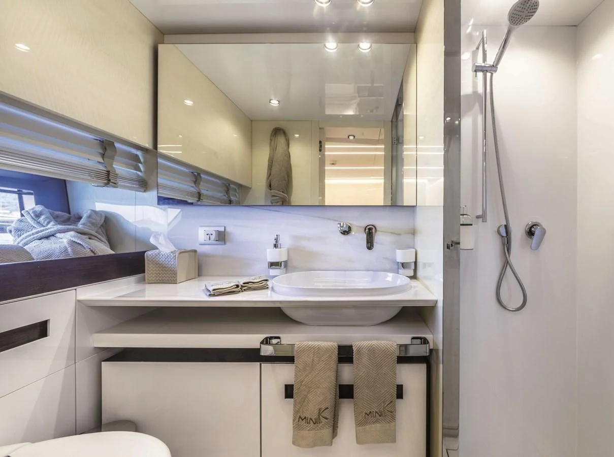 a bathroom with a large mirror aboard SONEY Yacht for Sale