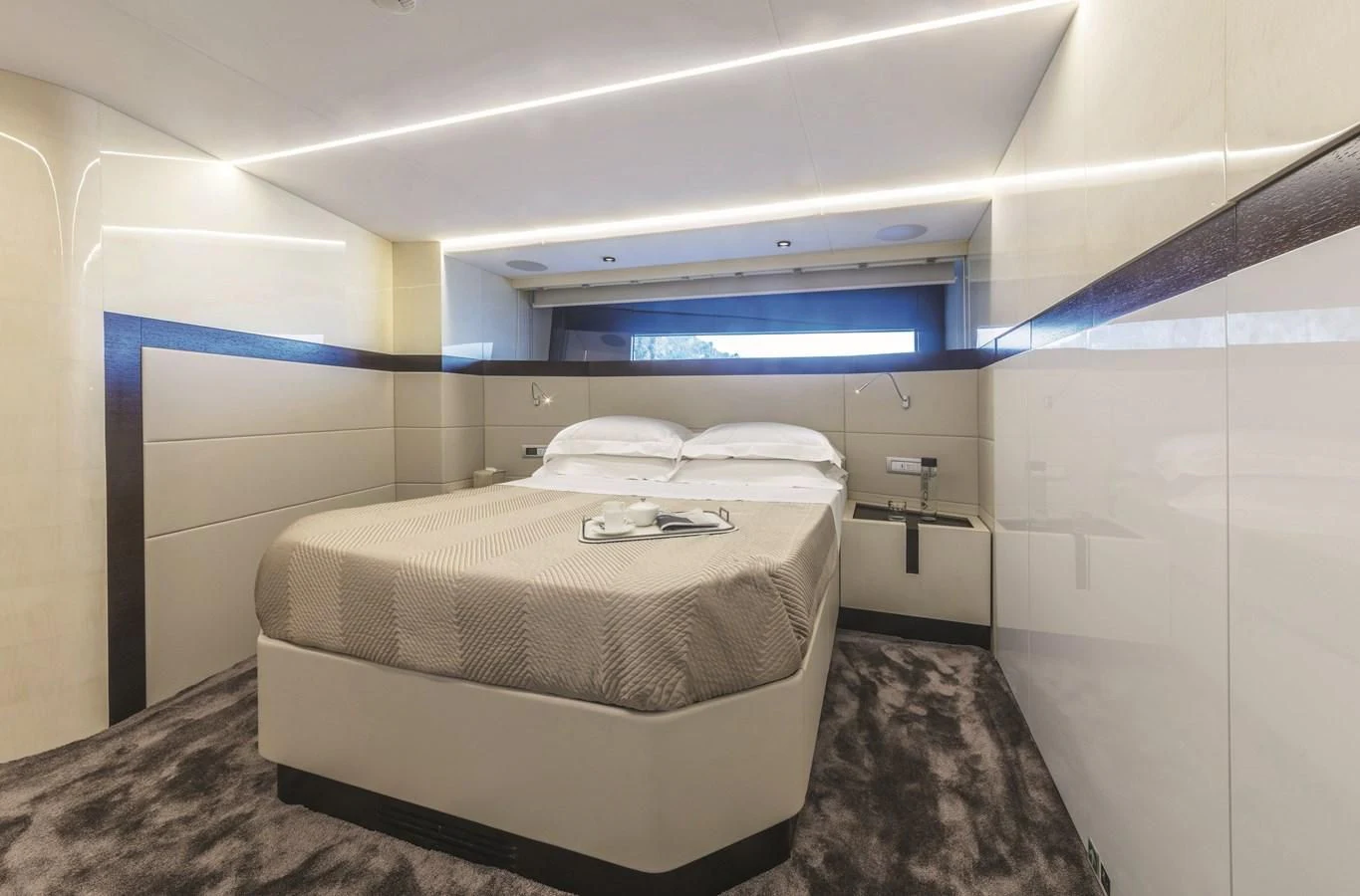 a room with a bed and a window aboard SONEY Yacht for Sale