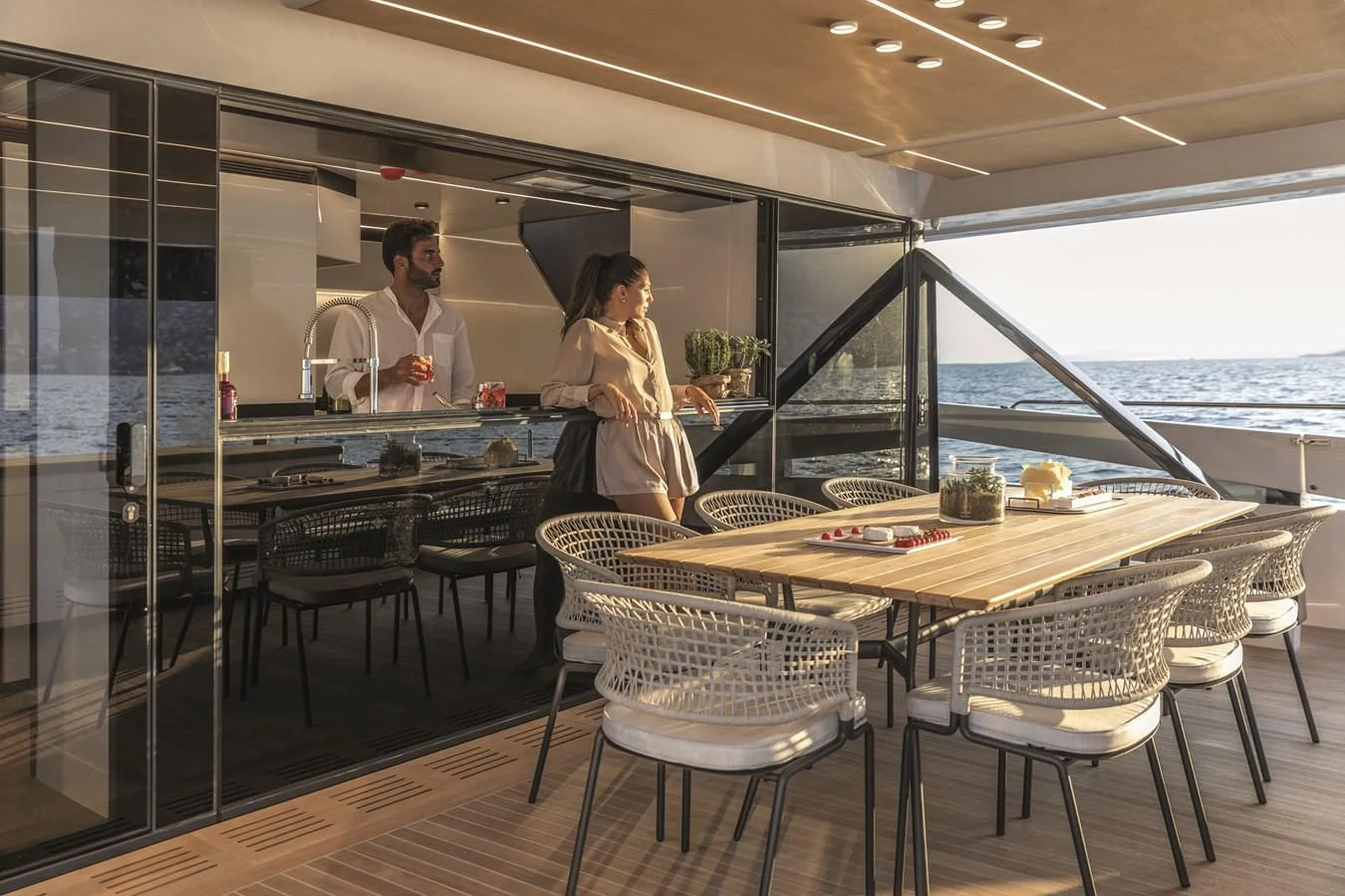 a man and woman in a restaurant aboard SONEY Yacht for Sale