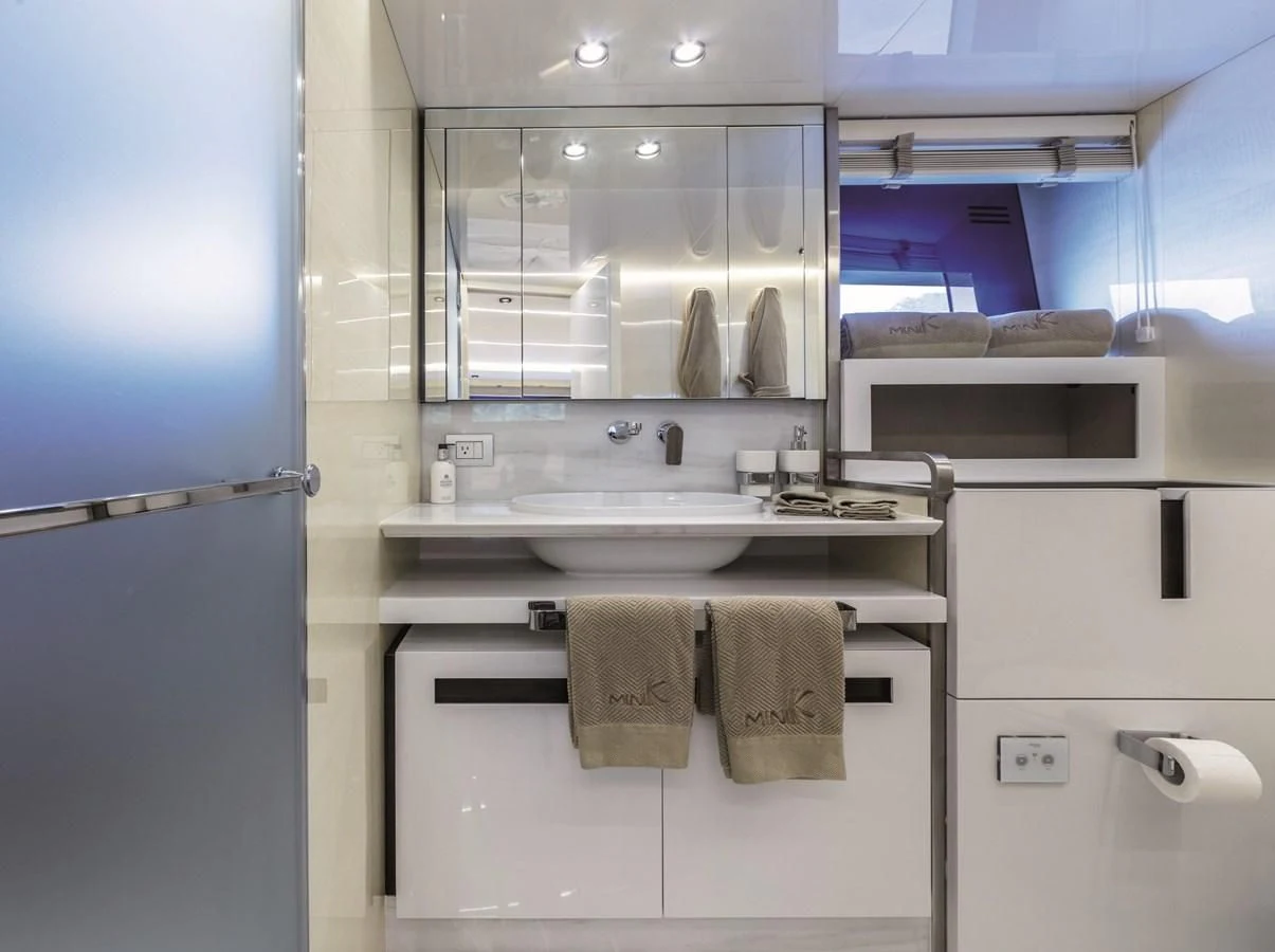 a bathroom with a sink and cabinets aboard SONEY Yacht for Sale