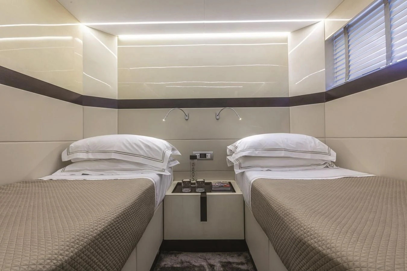 a couple of beds in a room aboard SONEY Yacht for Sale
