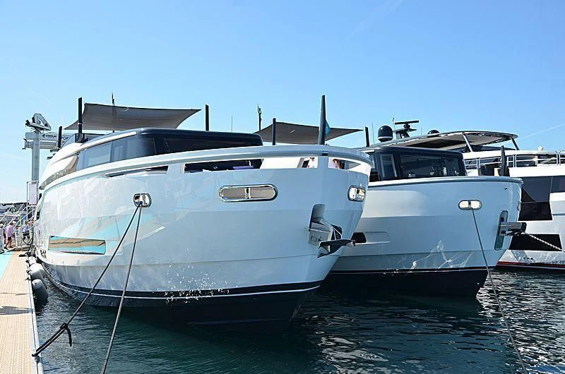 a couple of boats are parked in a harbor aboard SONEY Yacht for Sale