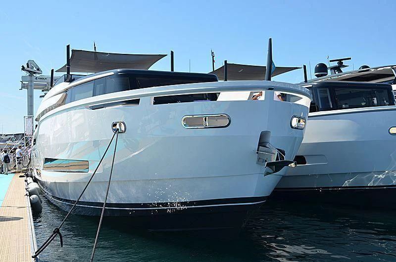 a white yacht docked aboard SONEY Yacht for Sale