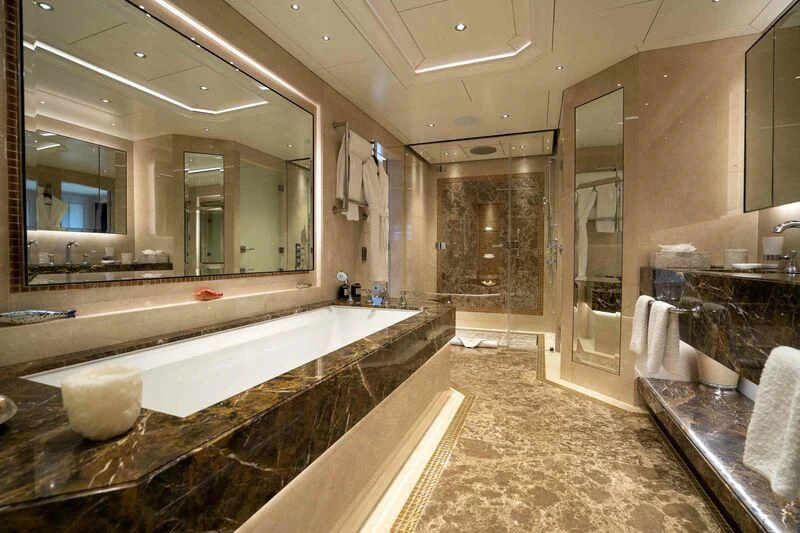 a bathroom with a large tub aboard TACANUYA Yacht for Charter