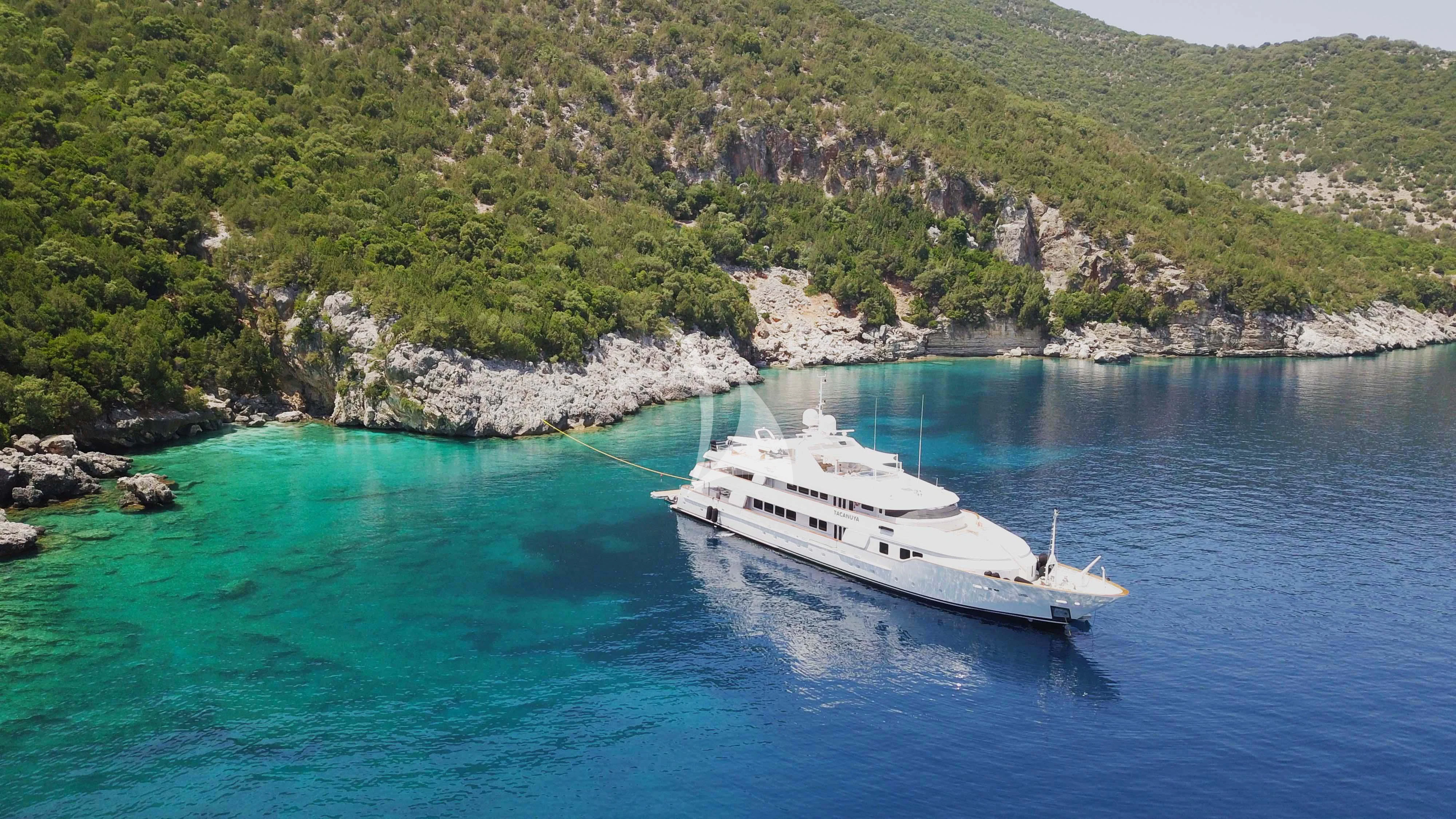 a boat sailing in the water aboard TACANUYA Yacht for Charter