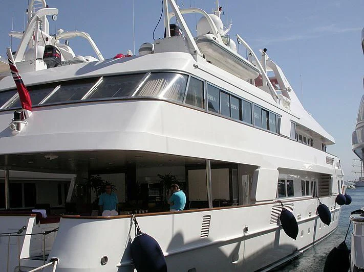 a large white yacht aboard TACANUYA Yacht for Charter