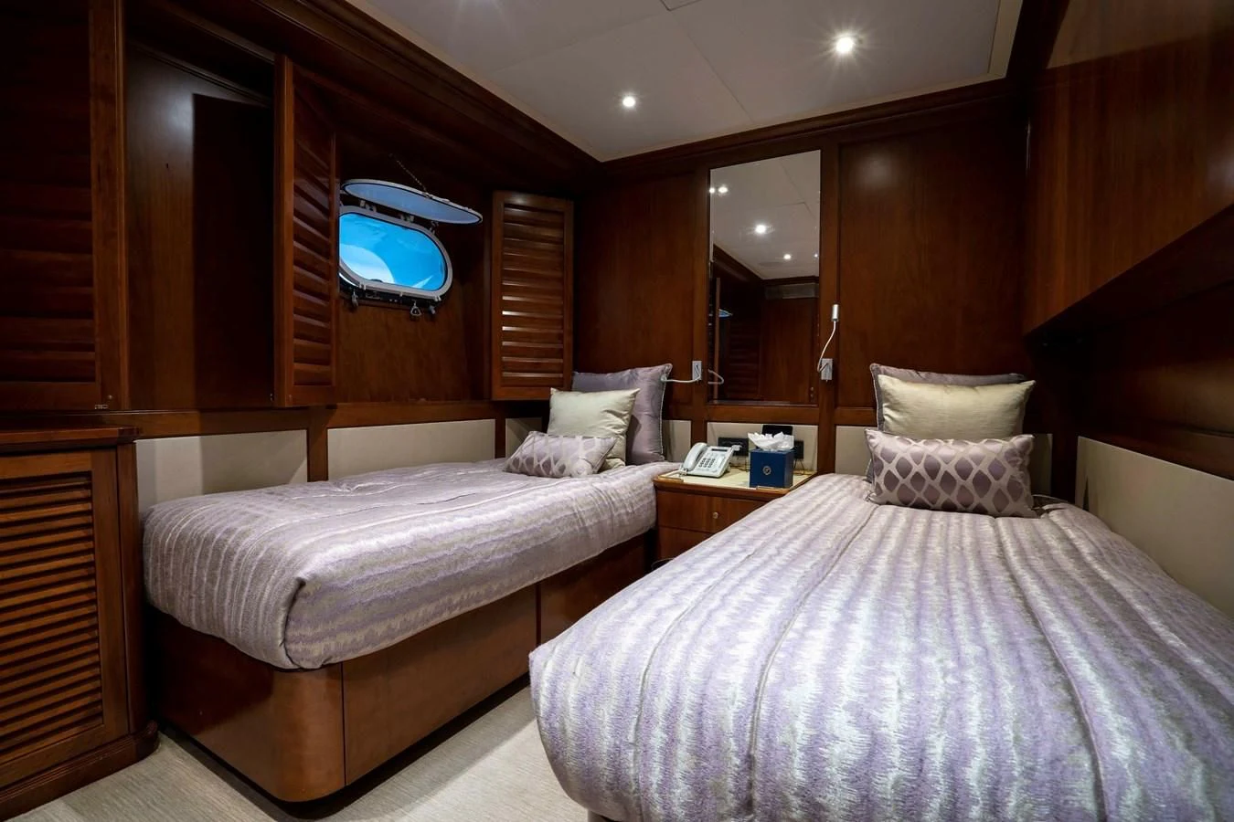 a couple of beds in a room aboard TACANUYA Yacht for Charter