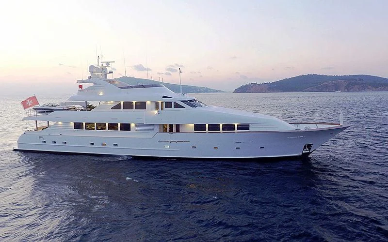 a large white yacht in the water aboard MERVE Yacht for Sale