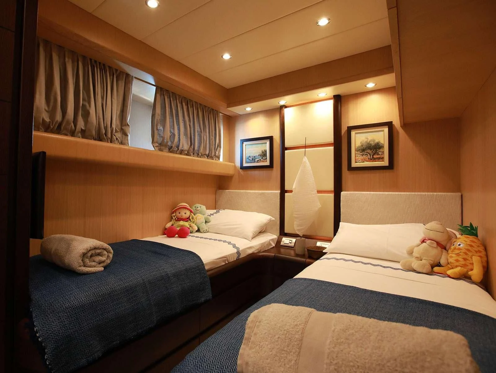 a couple of beds in a hotel room aboard HOPE I Yacht for Charter