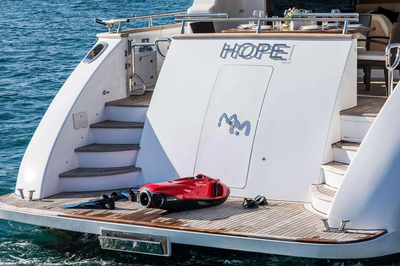 a boat with a motor on the front aboard HOPE I Yacht for Charter