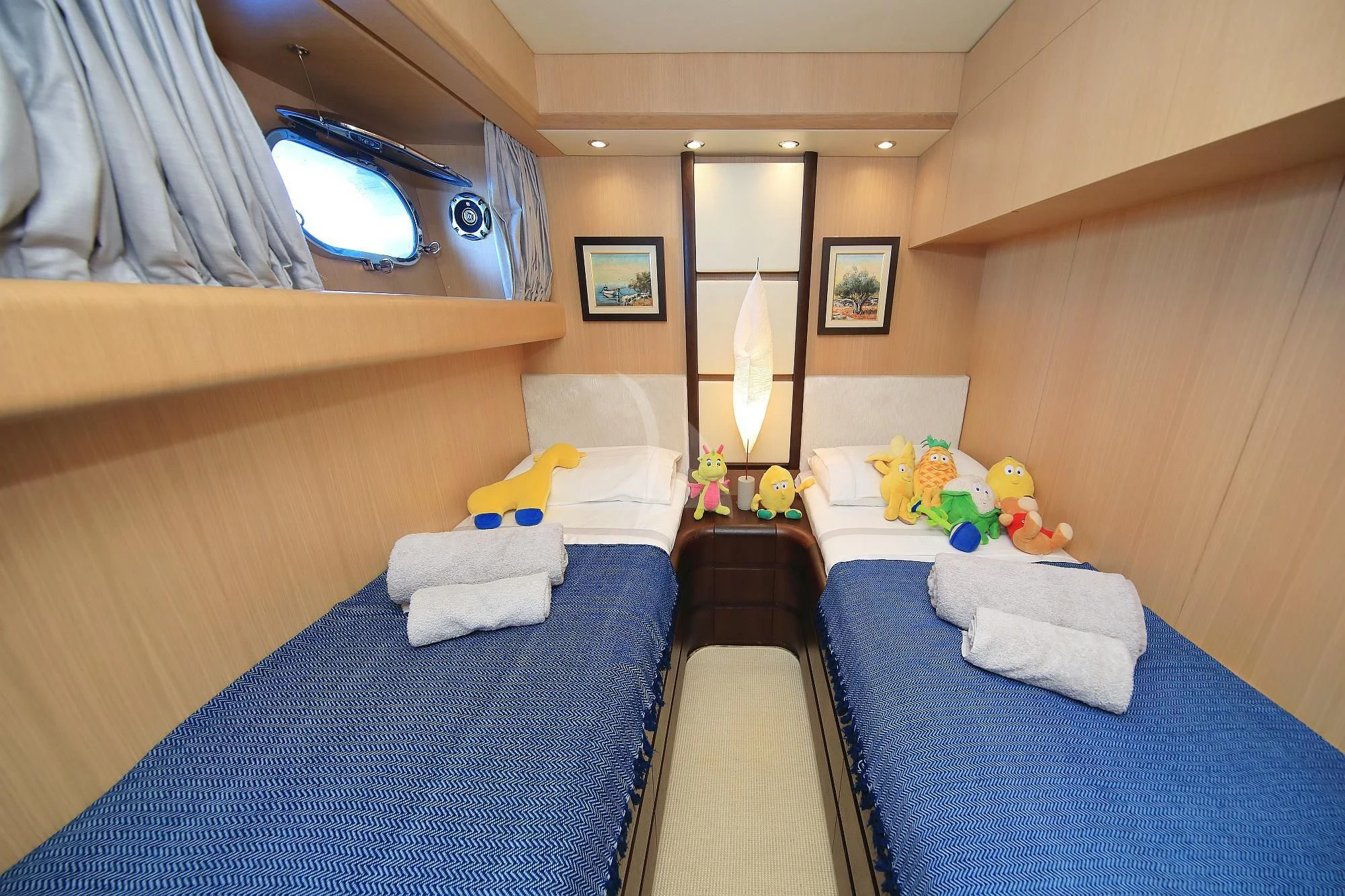 a room with a couple beds aboard HOPE I Yacht for Charter