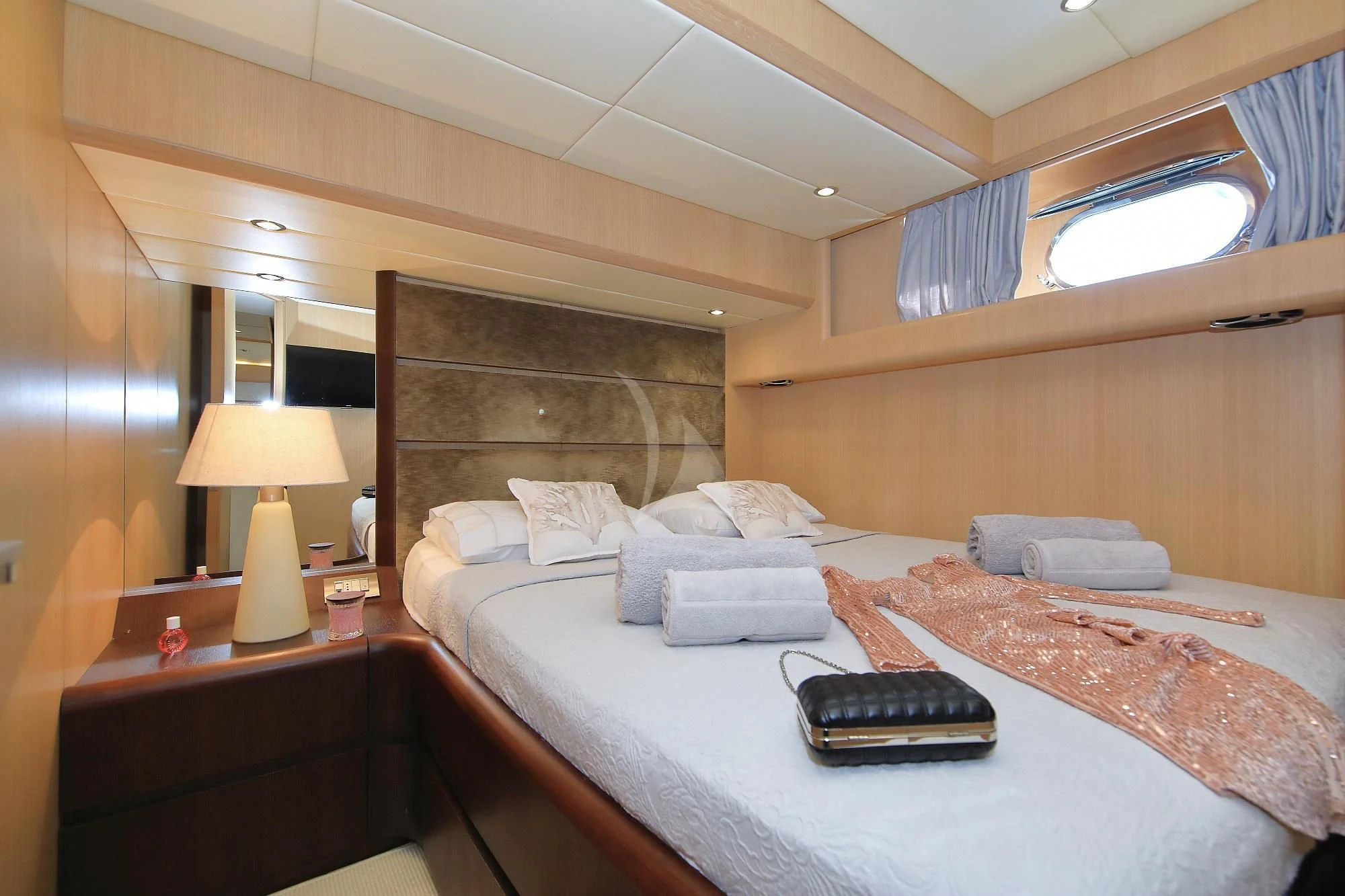 a bed with a laptop on it aboard HOPE I Yacht for Charter