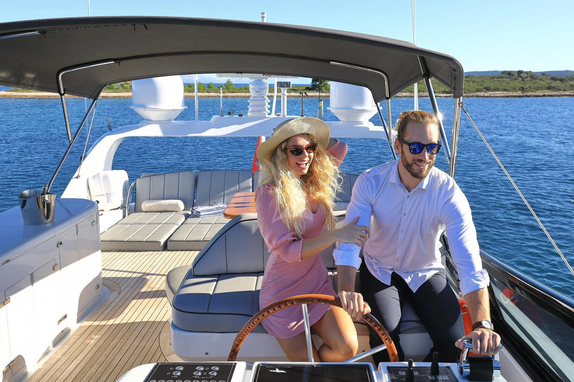 a man and woman on a boat aboard HOPE I Yacht for Charter
