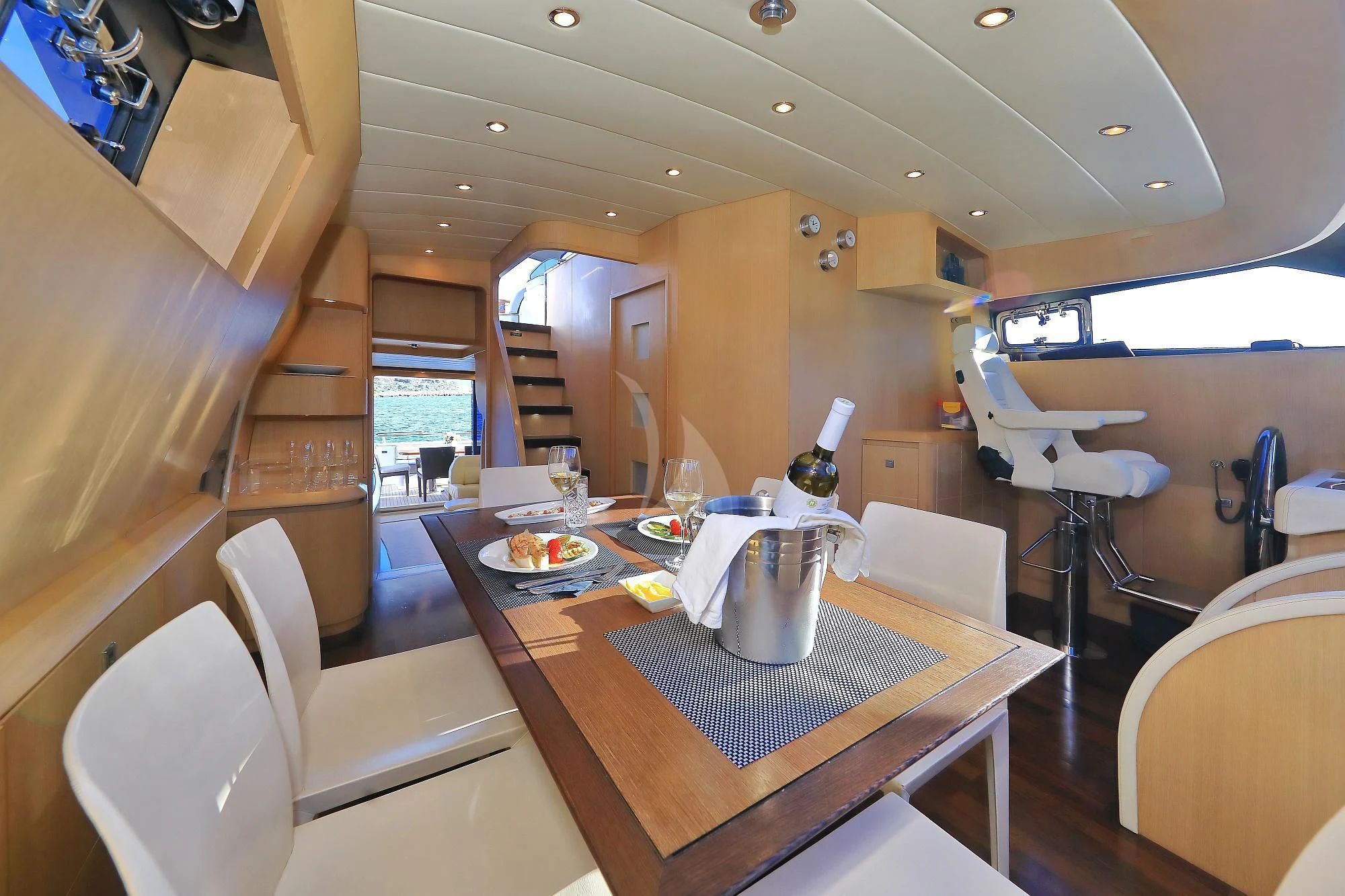 a dining table in a room aboard HOPE I Yacht for Charter