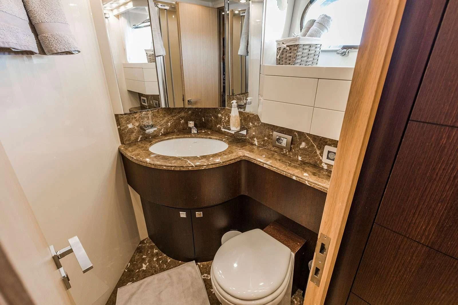 a bathroom with a sink and toilet aboard HOPE I Yacht for Charter