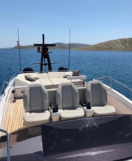 a boat with chairs on it aboard MIRLO BLANCO Yacht for Sale