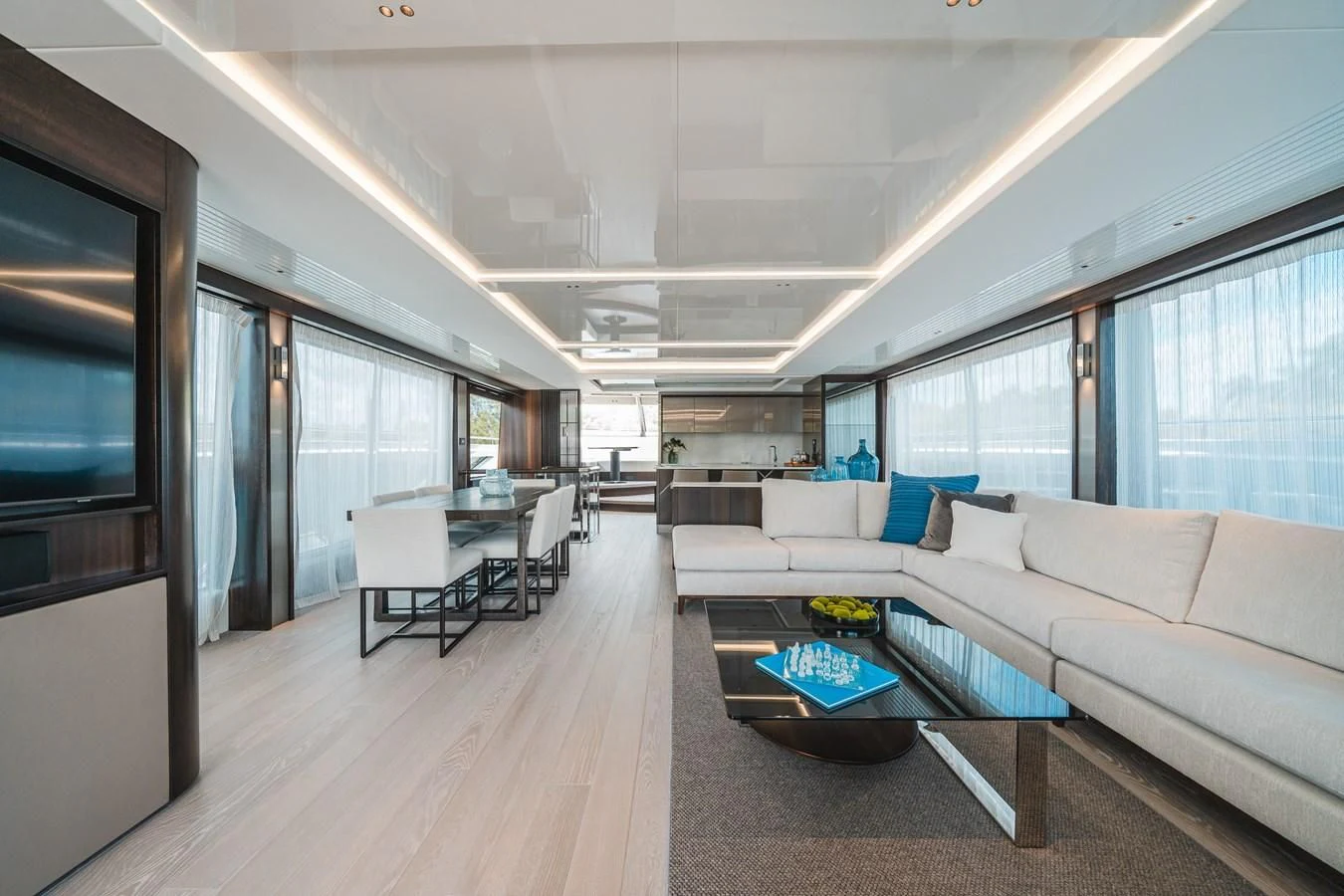 a living room with a couch and a table aboard 90 OCEAN Yacht for Sale
