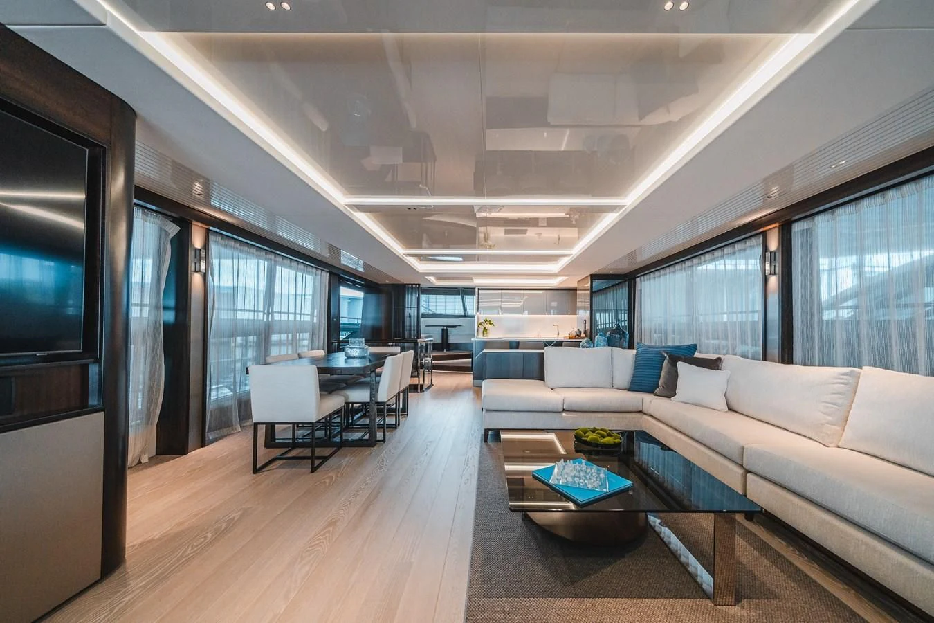 a living room with a large window aboard 90 OCEAN Yacht for Sale