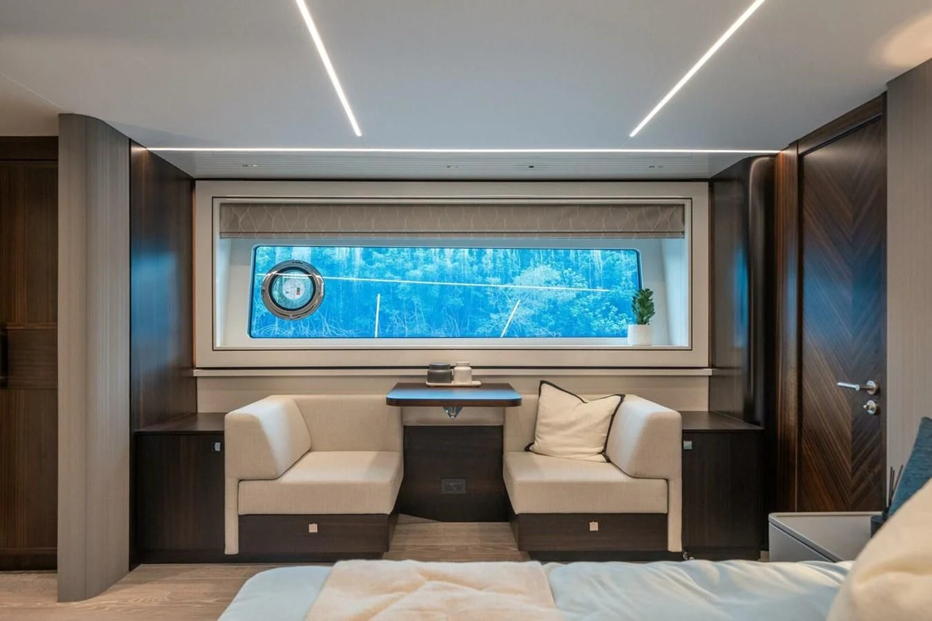 a room with a couch and a table aboard 90 OCEAN Yacht for Sale