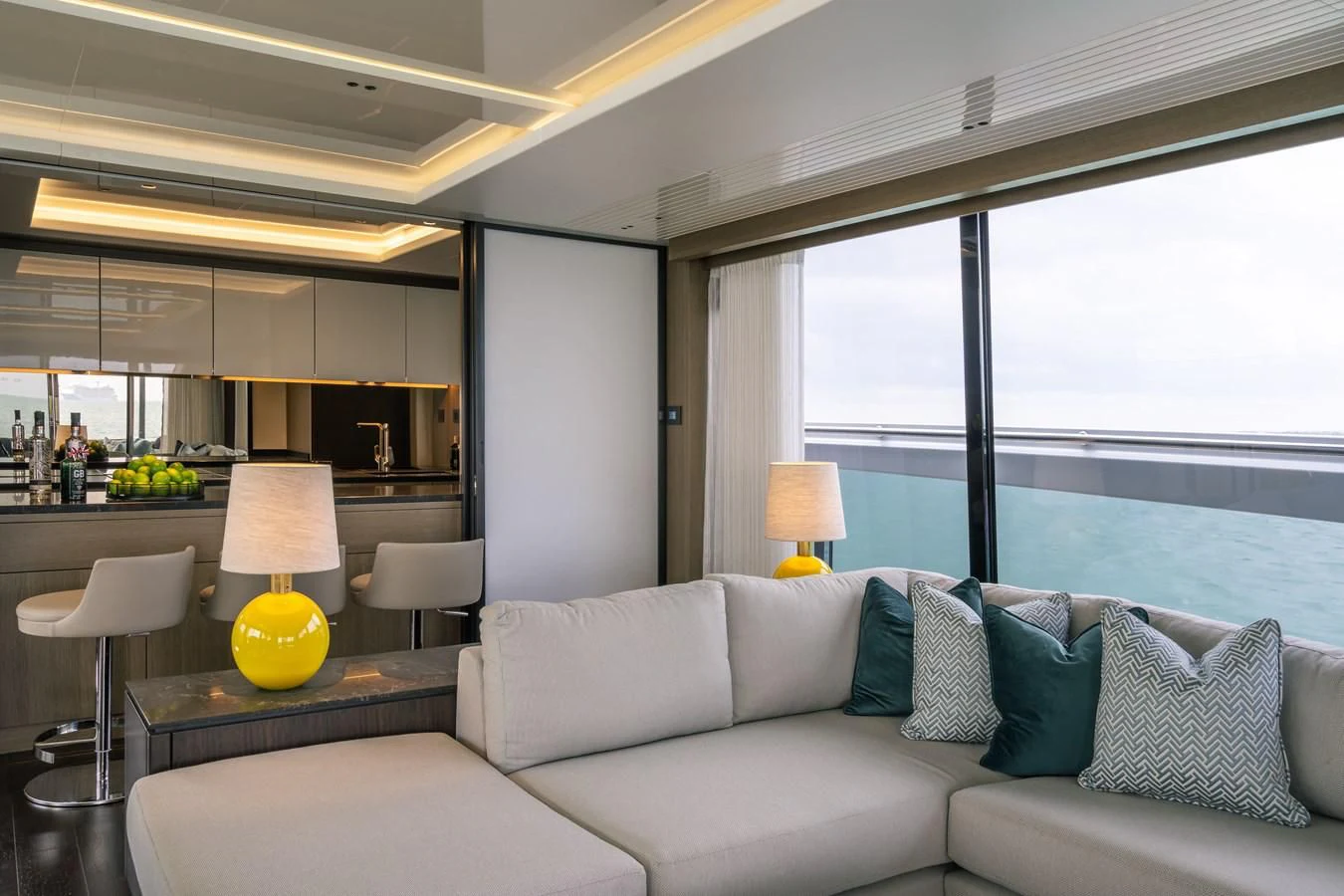 a living room with a large window aboard 90 OCEAN Yacht for Sale