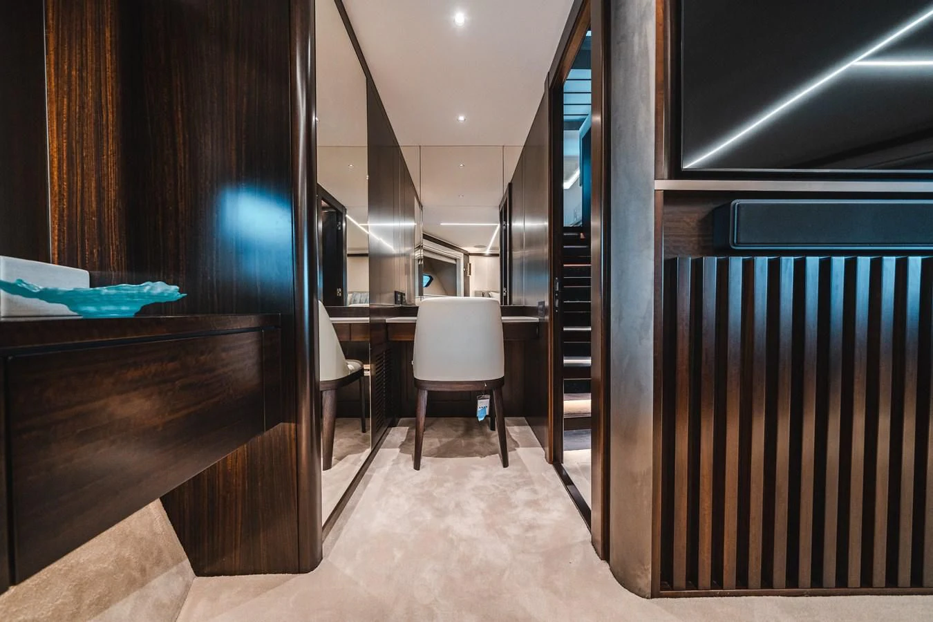 a room with a chair and a desk aboard 90 OCEAN Yacht for Sale