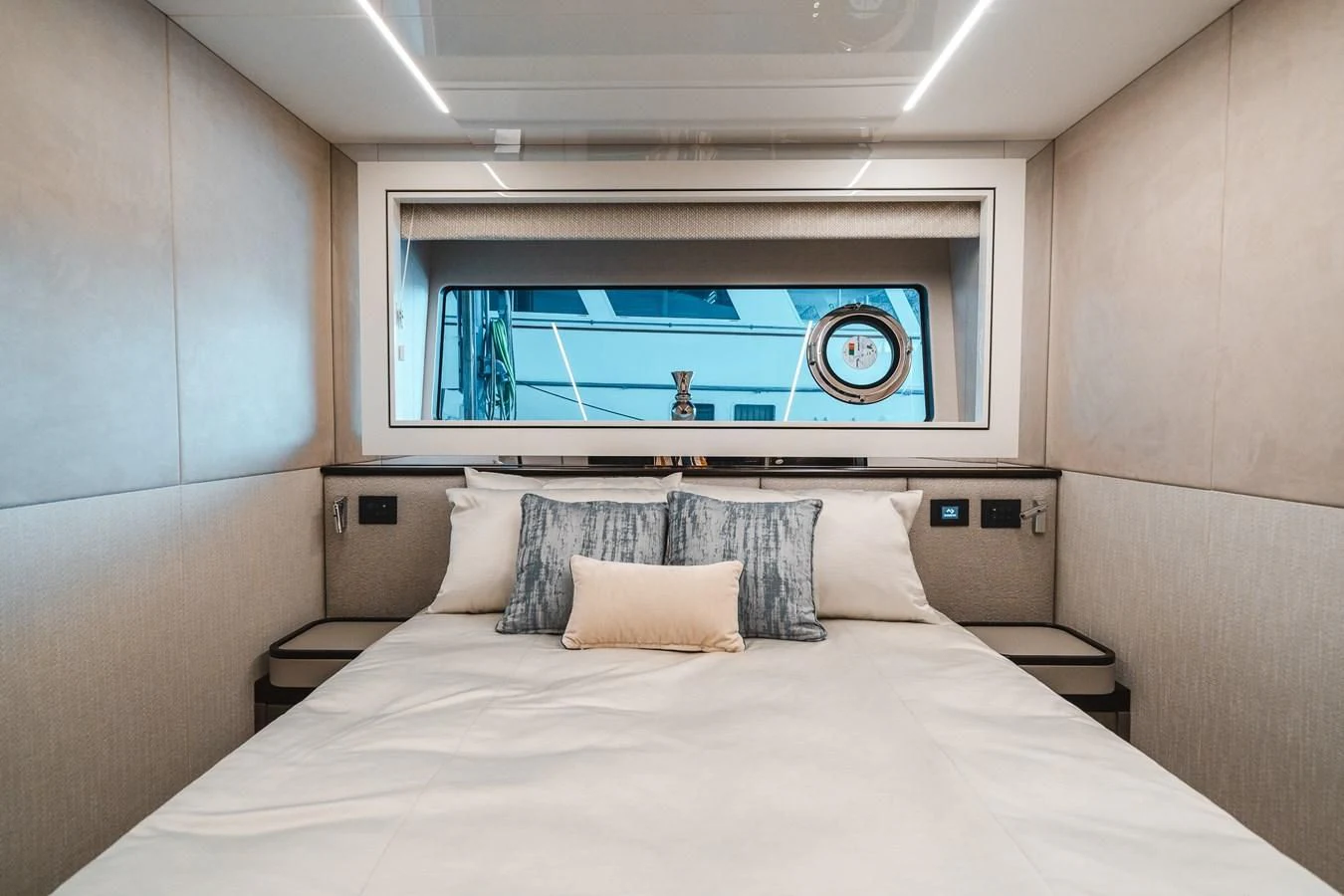 a bed with a white bed spread aboard 90 OCEAN Yacht for Sale
