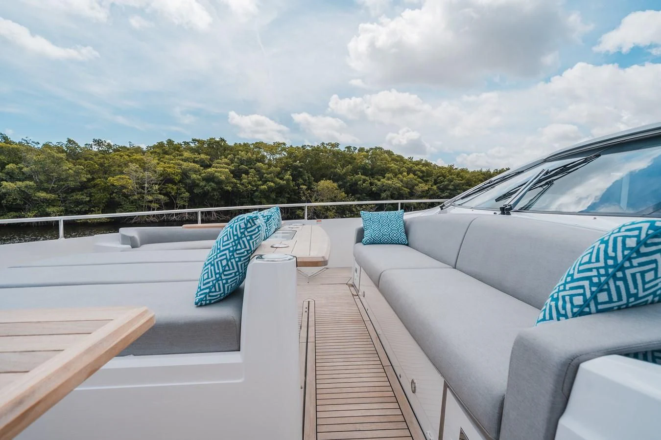 a car on a deck aboard 90 OCEAN Yacht for Sale
