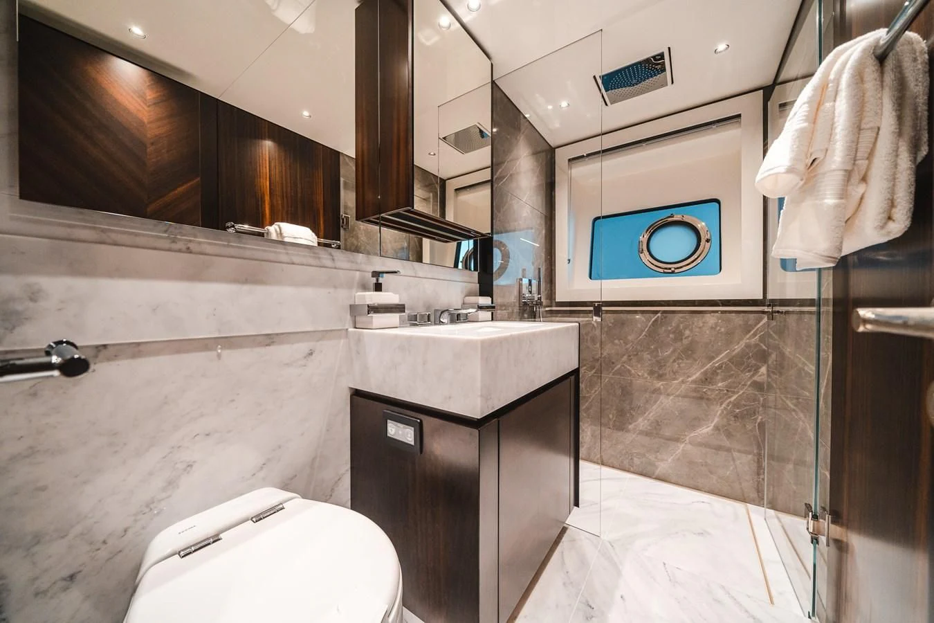 a bathroom with a sink and a toilet aboard 90 OCEAN Yacht for Sale