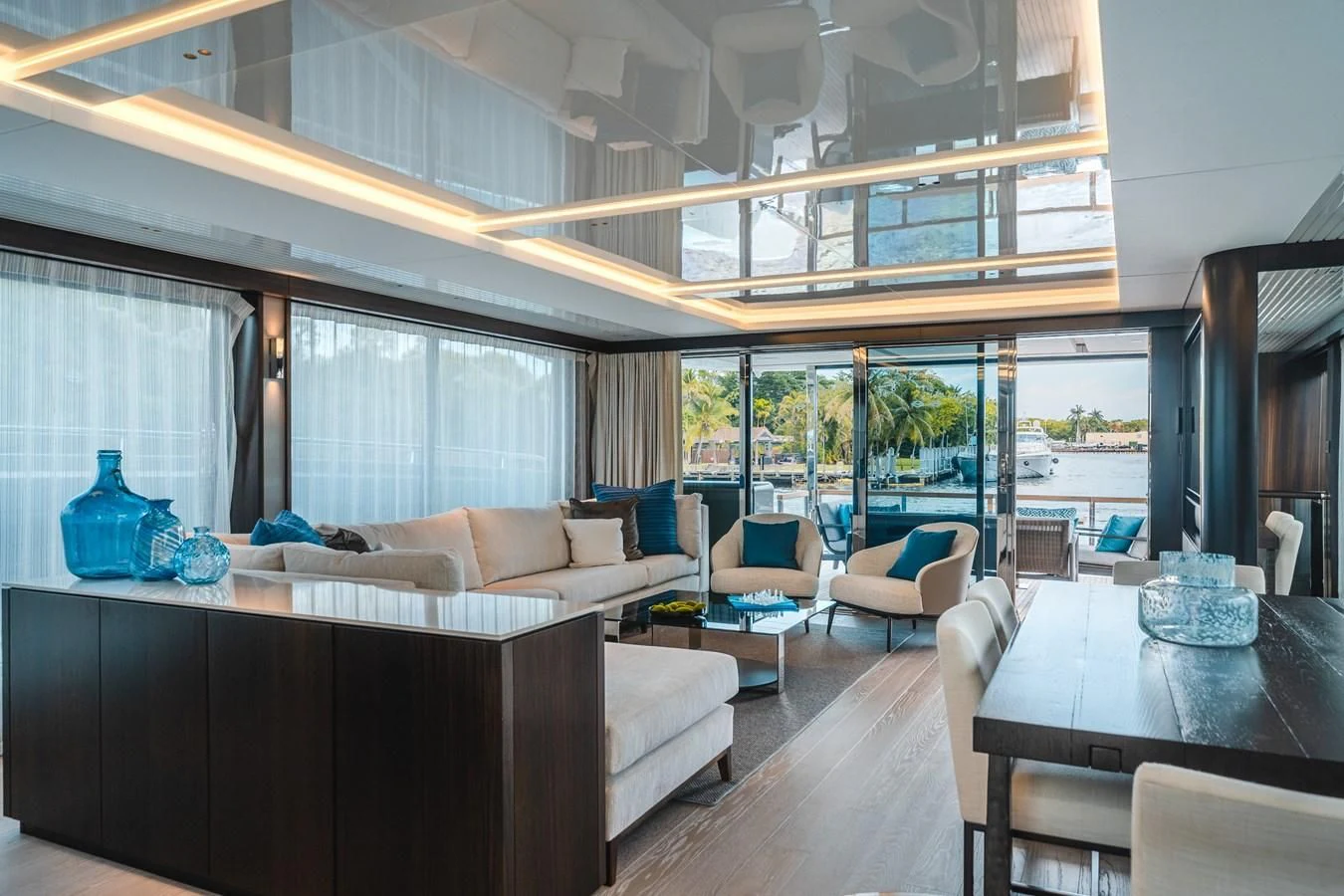 a living room with a large window aboard 90 OCEAN Yacht for Sale
