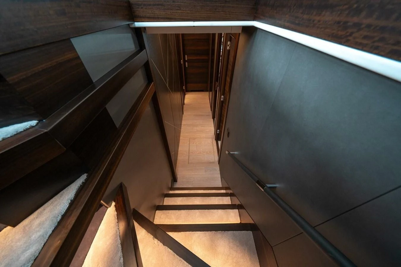 a hallway with wooden doors aboard 90 OCEAN Yacht for Sale