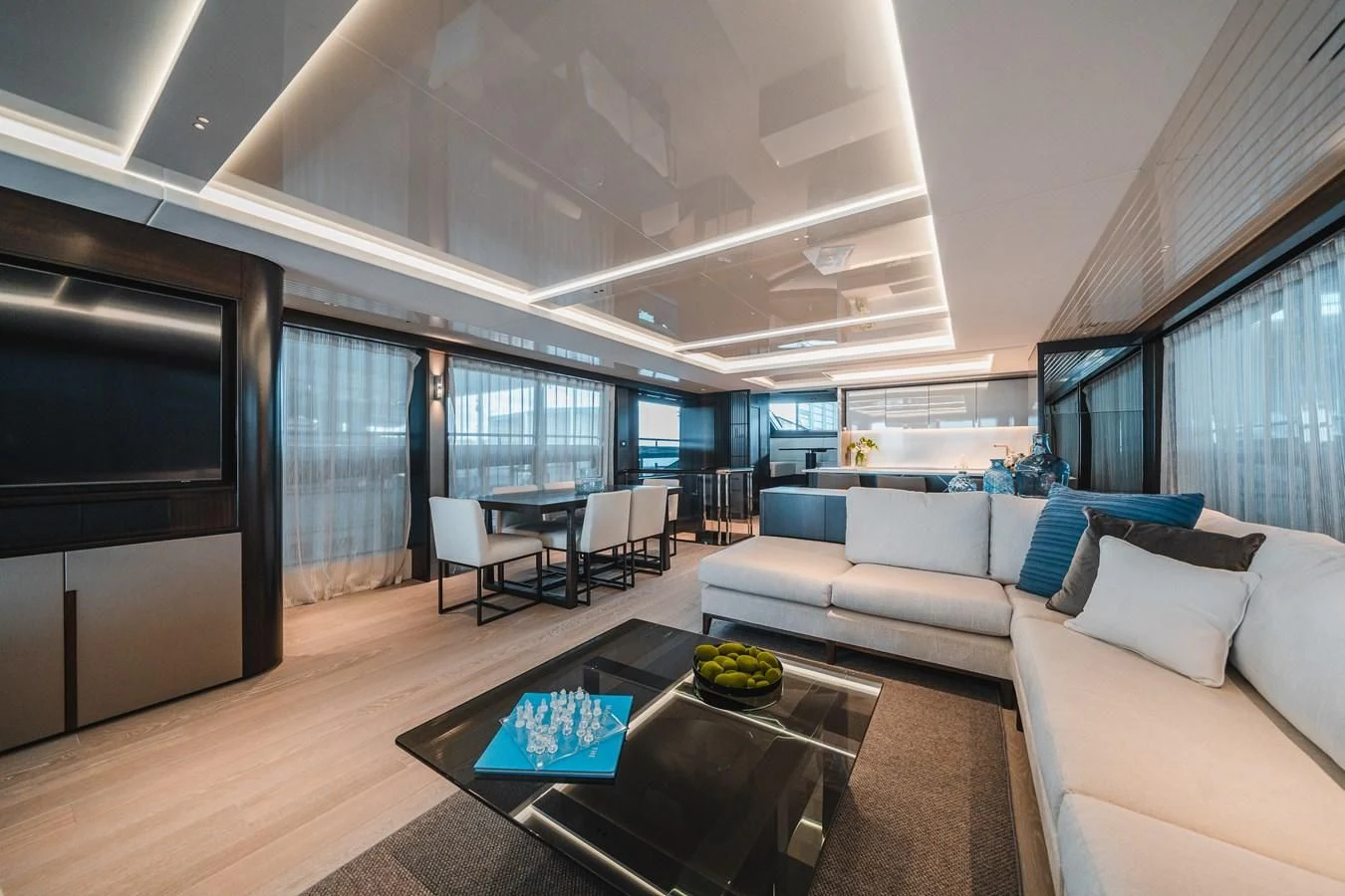 a living room with a large window aboard 90 OCEAN Yacht for Sale