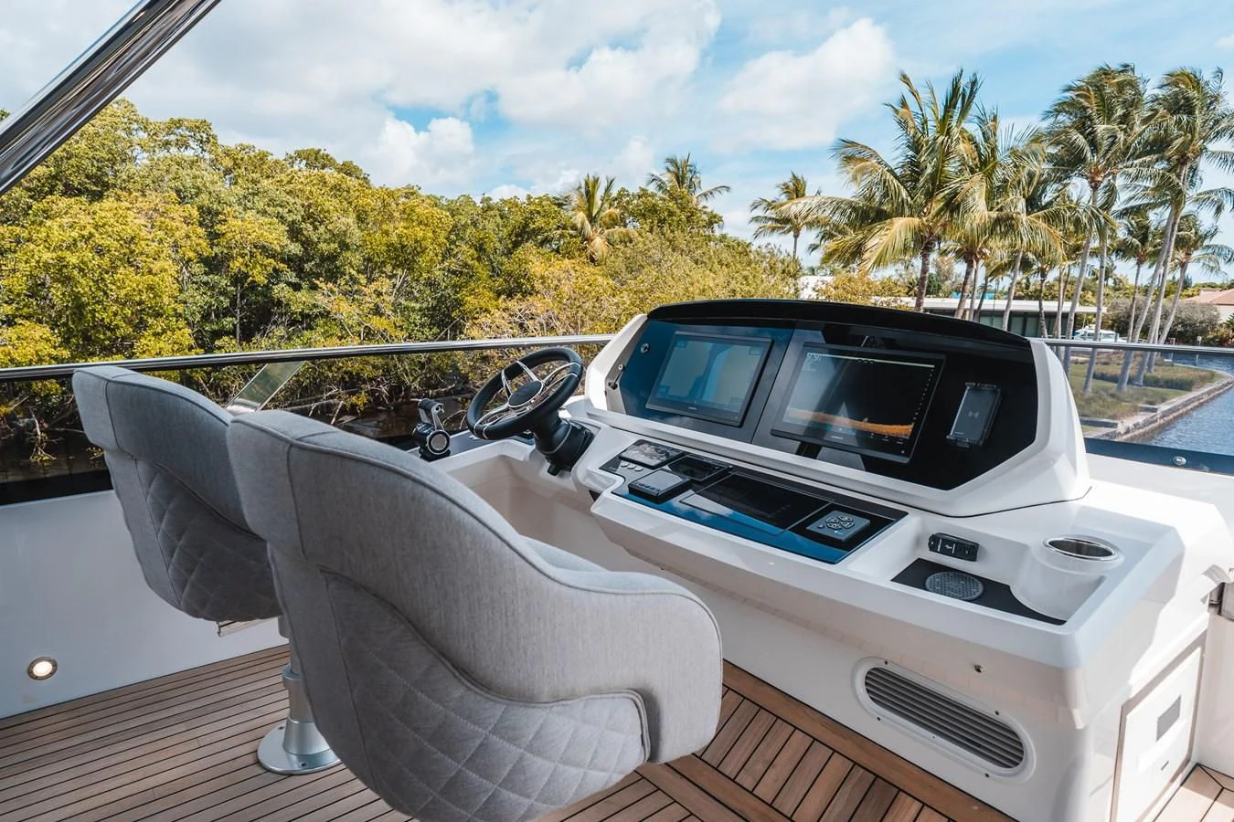 a car on a boat aboard 90 OCEAN Yacht for Sale