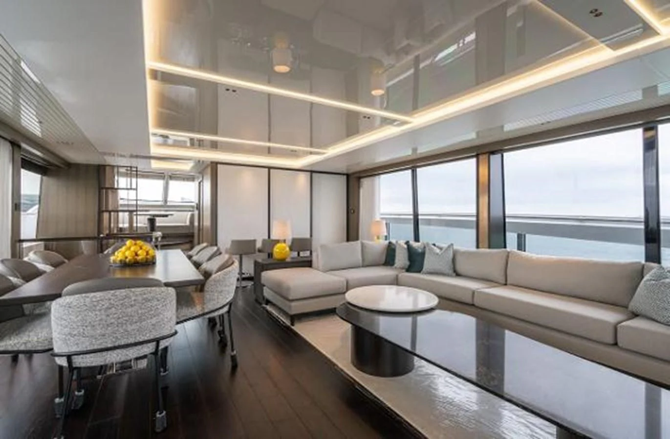a living room with a large window aboard 90 OCEAN Yacht for Sale