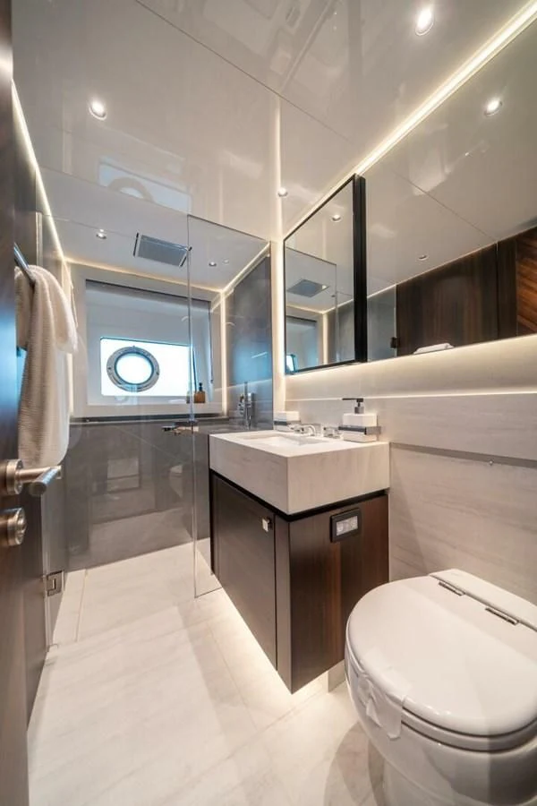a bathroom with a sink and a toilet aboard 90 OCEAN Yacht for Sale