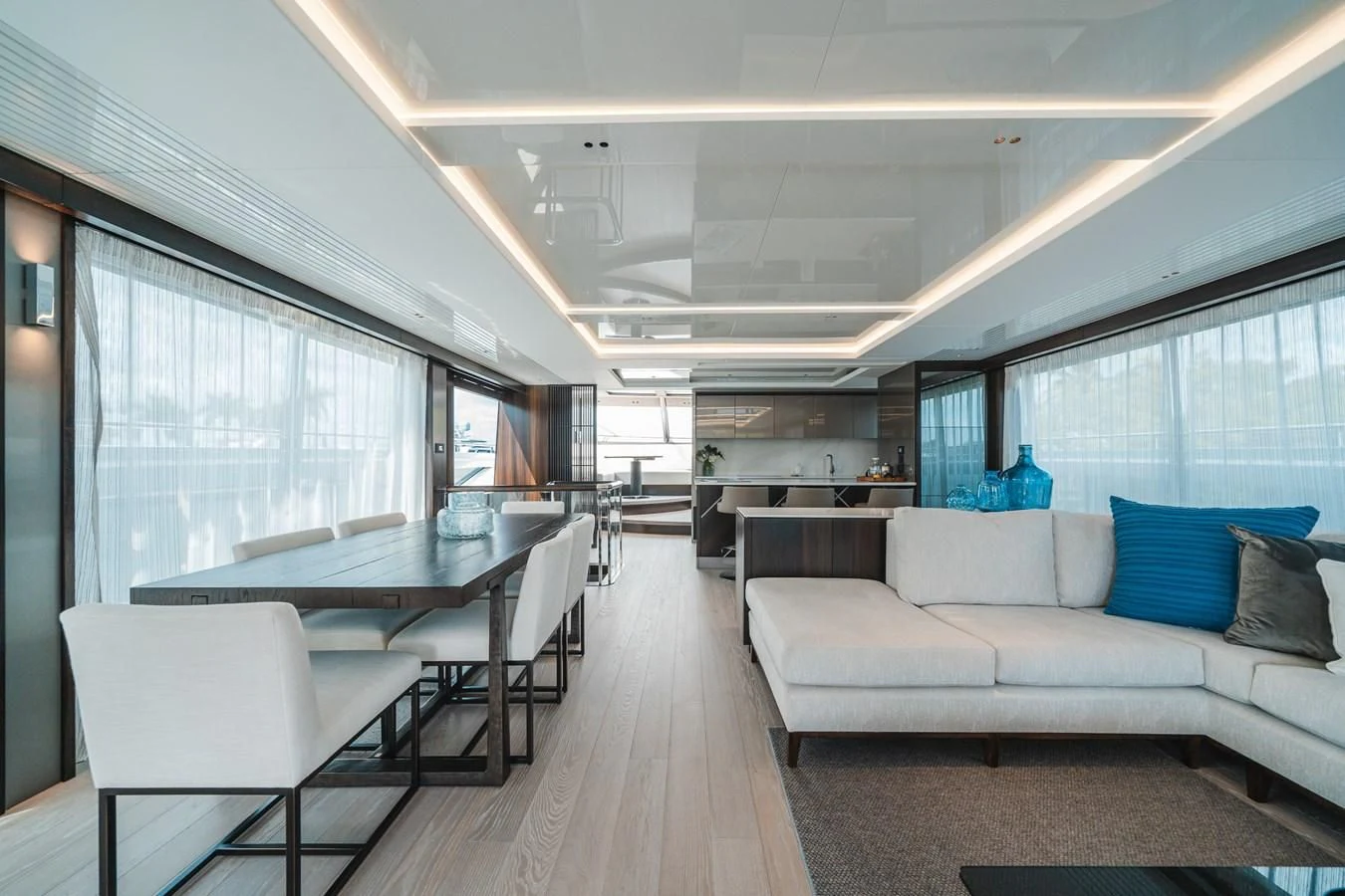 a large room with a couch and a table aboard 90 OCEAN Yacht for Sale