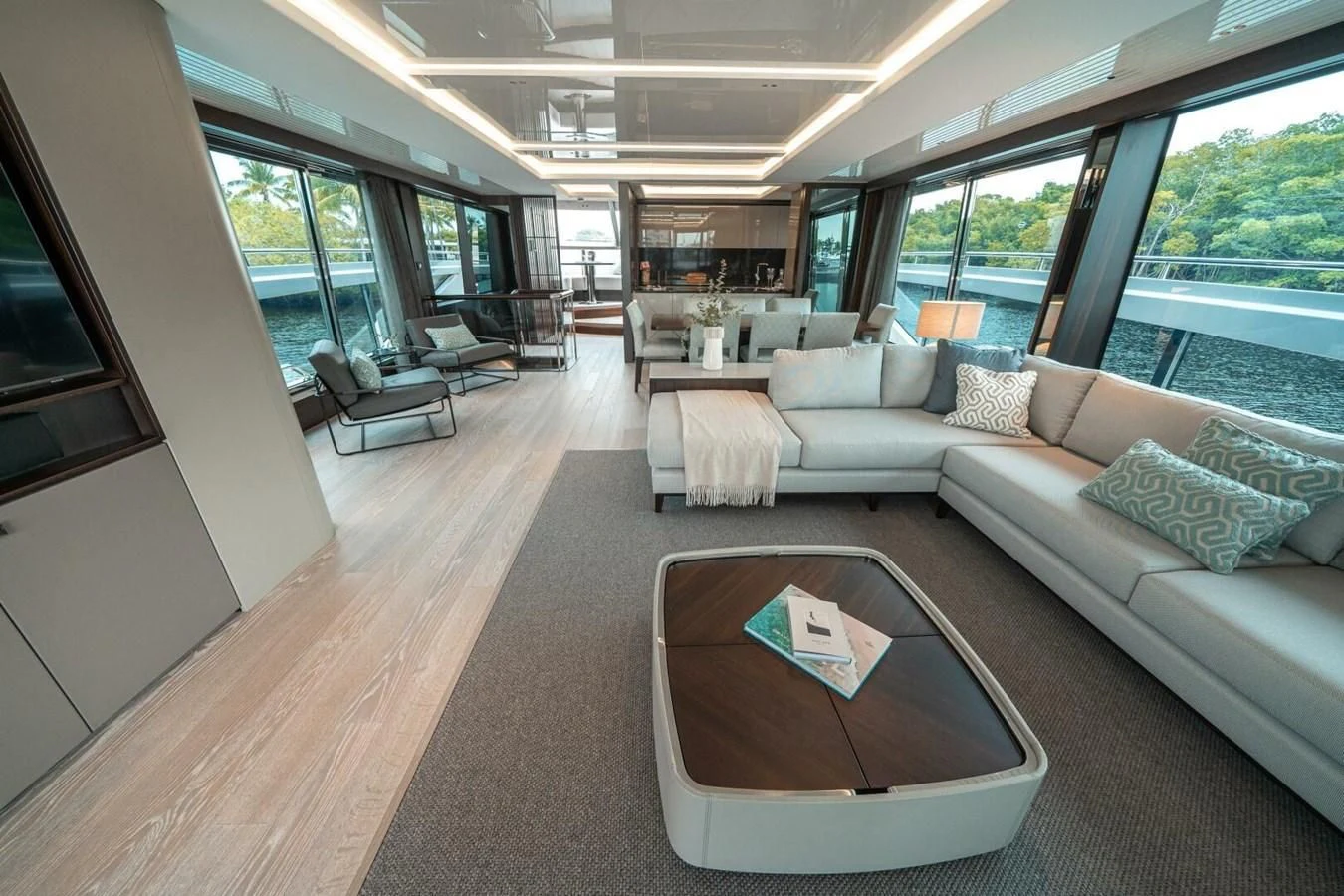a living room with a couch and a tv aboard 90 OCEAN Yacht for Sale