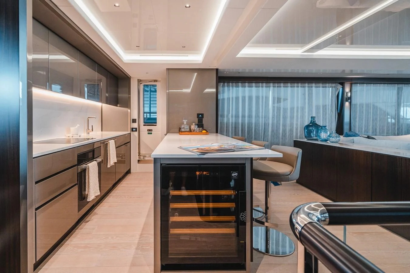 a kitchen with a stove and cabinets aboard 90 OCEAN Yacht for Sale