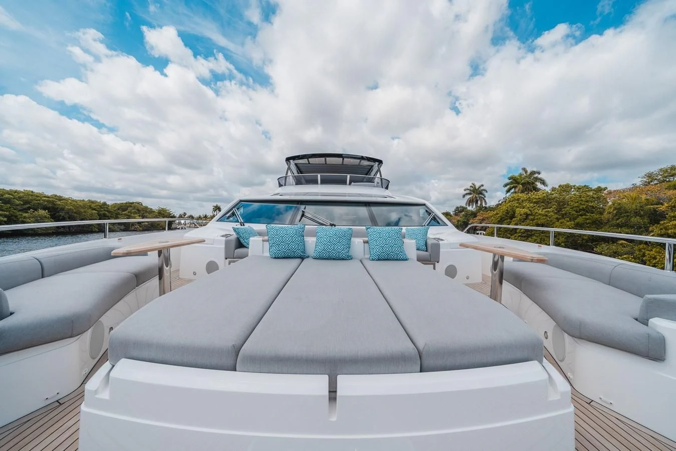 a white car with a blue roof aboard 90 OCEAN Yacht for Sale