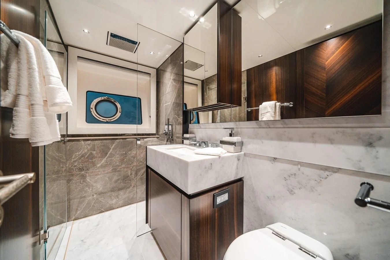 a bathroom with a sink and a toilet aboard 90 OCEAN Yacht for Sale
