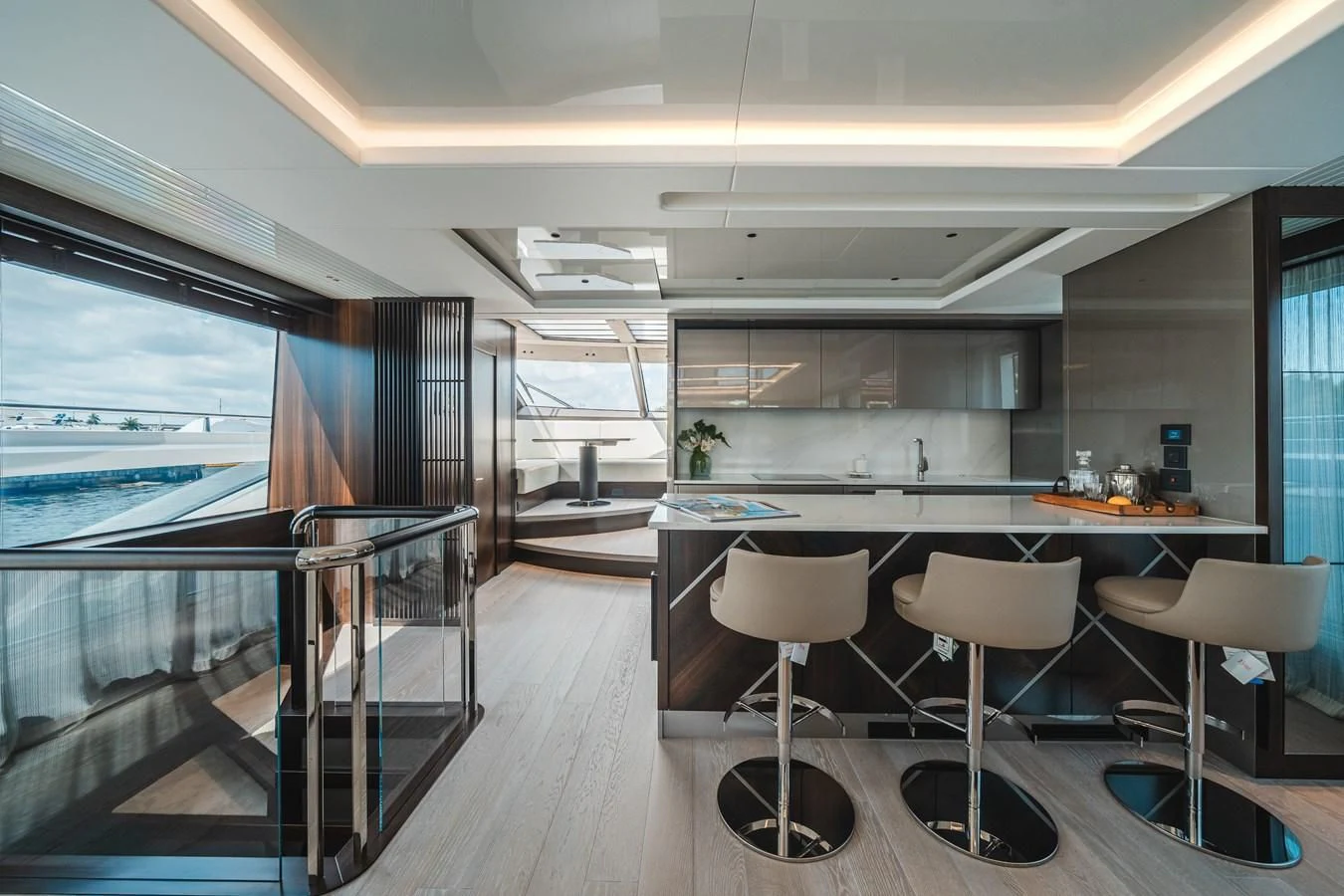 a room with a table and chairs aboard 90 OCEAN Yacht for Sale