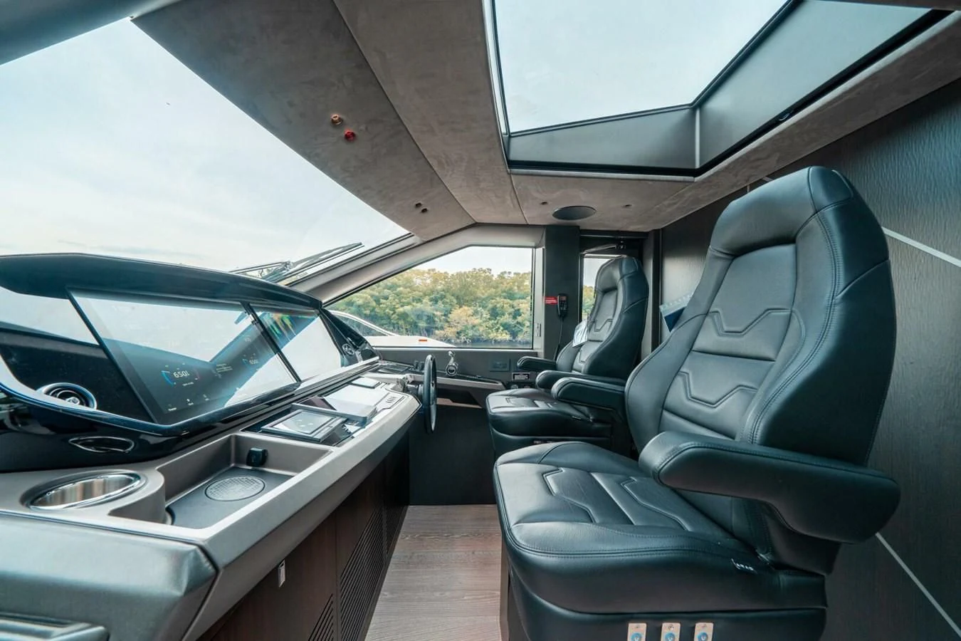 inside of a car aboard 90 OCEAN Yacht for Sale