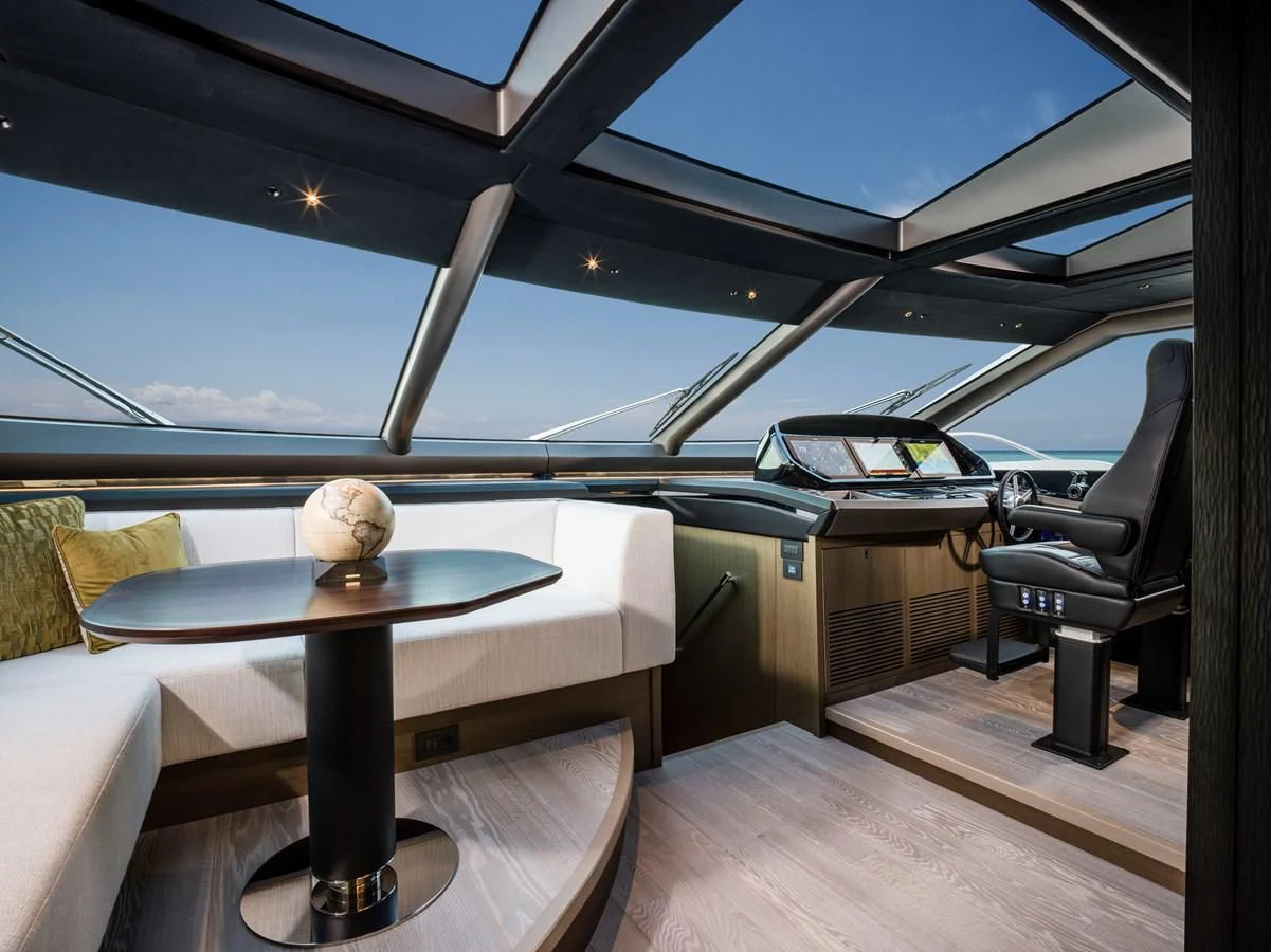 a table and chairs on a boat aboard 90 OCEAN Yacht for Sale