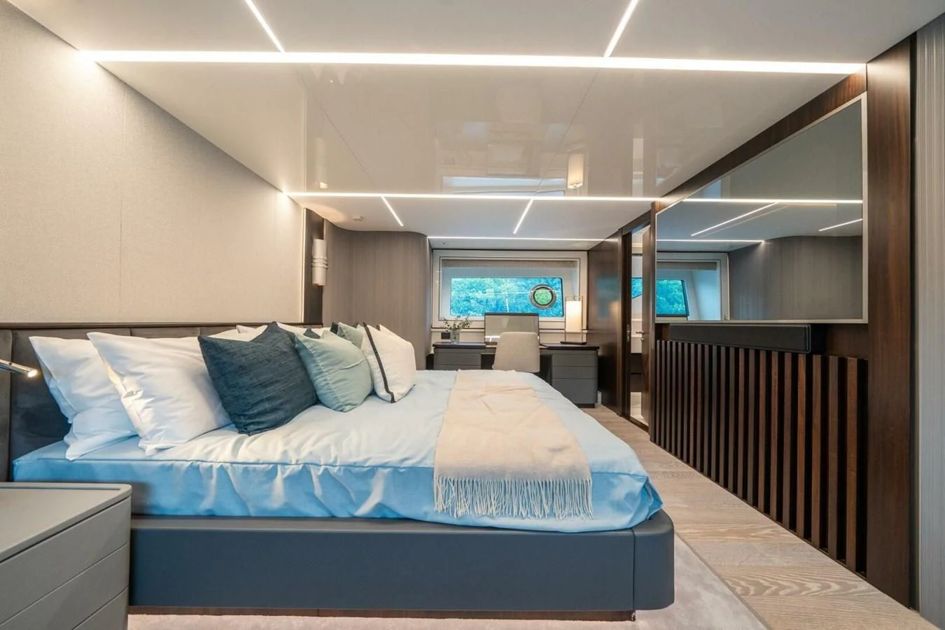 a room with a bed and a television aboard 90 OCEAN Yacht for Sale
