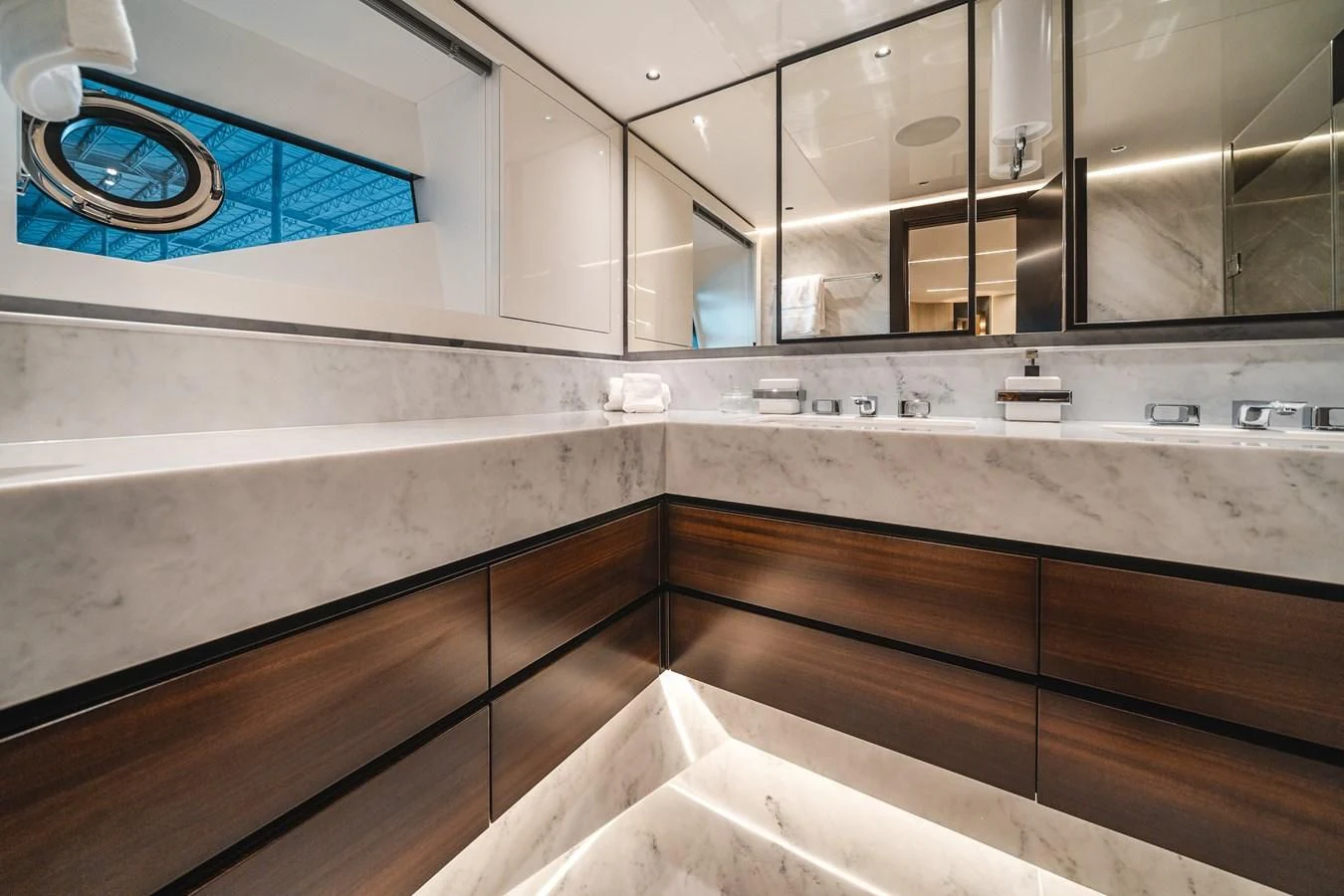 a kitchen with a sink and cabinets aboard 90 OCEAN Yacht for Sale